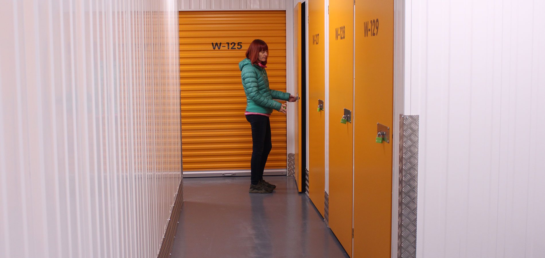 woman locking up her storage room